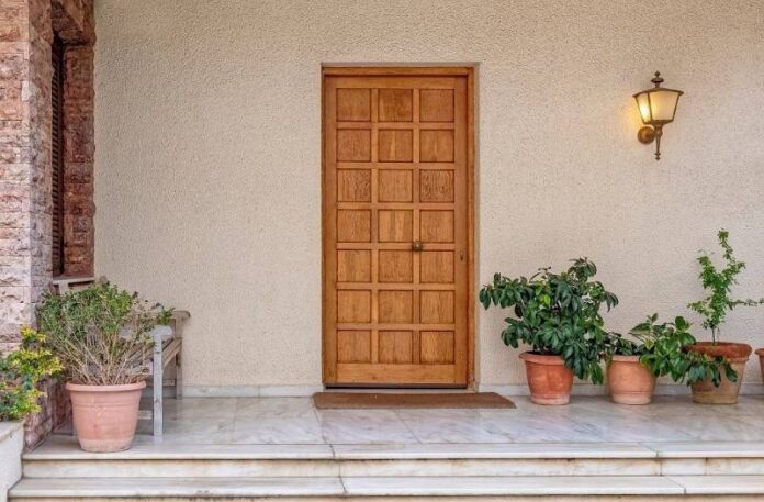 tulsi plant on gate