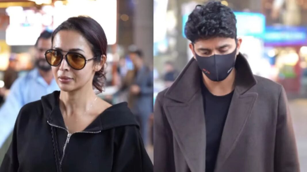 एयरपोर्ट पर मलाइका अरोड़ा के साथ दिखा ‘मास्क वाला मिस्ट्री मैन’, वीडियो देखते ही फैंस चौंके, बोले- “ये तो वही कॉन्सर्ट वाला…”