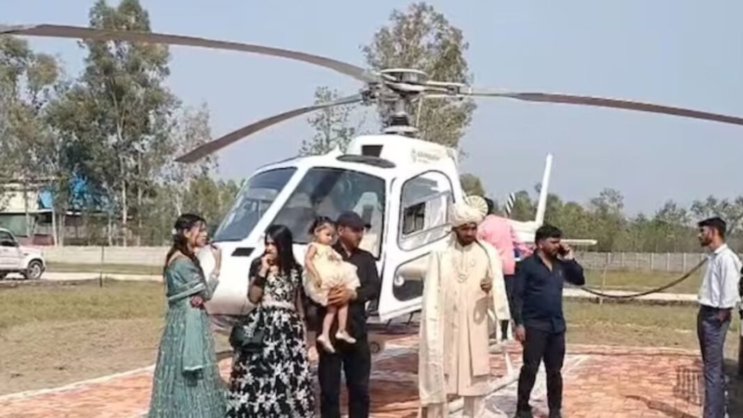 किसान के बेटे ने हेलिकॉप्टर से निकाली बारात, दुल्हन की विदाई को लेकर भी किया ऐसा ऐलान कि चर्चा में आई शादी! हेलिकॉप्टर